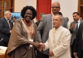 Catherine Odora Hoppers is thanked by Shri Pranab Mukherjee (President of India) 